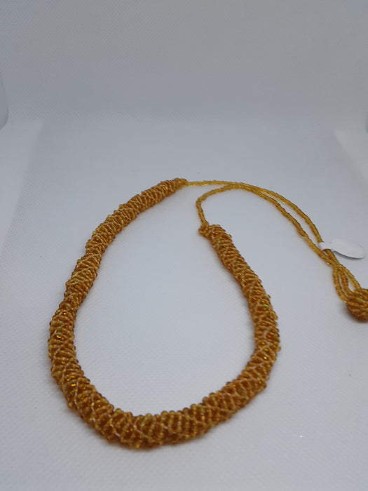 Handmade gold-beaded necklace, bracelet, and earring set