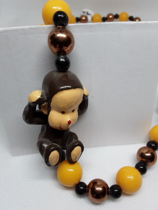 Plastic beaded monkey necklace