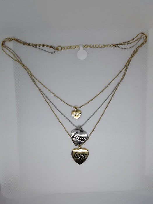 Triple-stranded necklace with three pendants