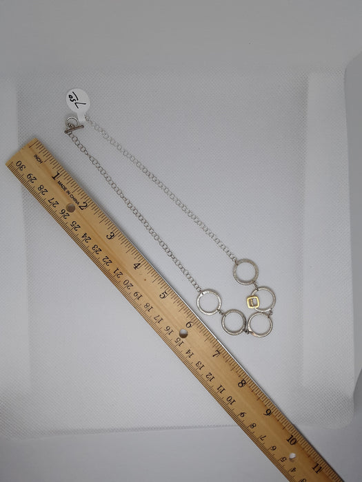 Silvertone circle necklace