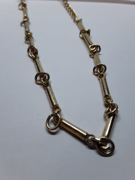 Goldtone rods and rings necklace