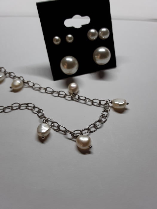 Silvertone necklace with white beads and earrings