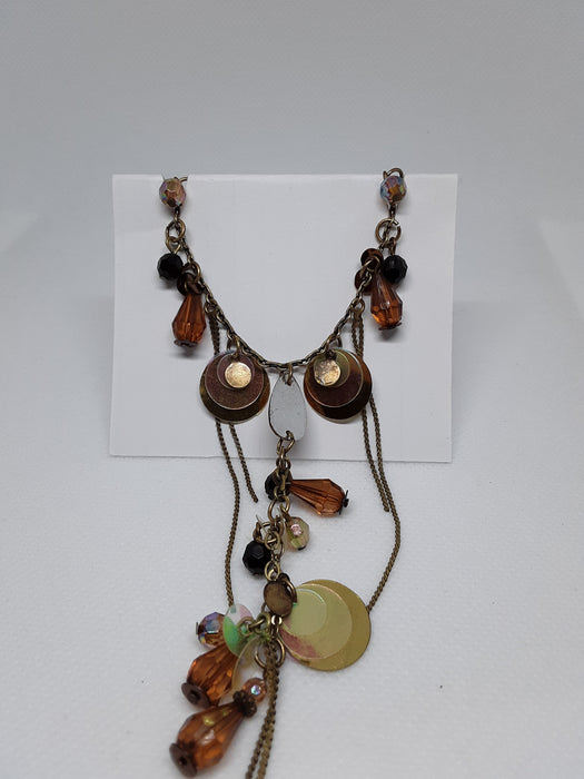 Eclectic brass tone necklace with earrings