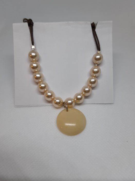 Cord necklace with faux pearls and earrings