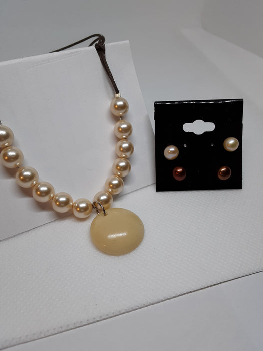 Cord necklace with faux pearls and earrings