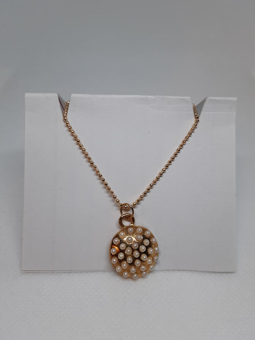Goldtone necklace with circle pendant and earrings 