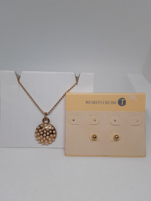 Goldtone necklace with circle pendant and earrings