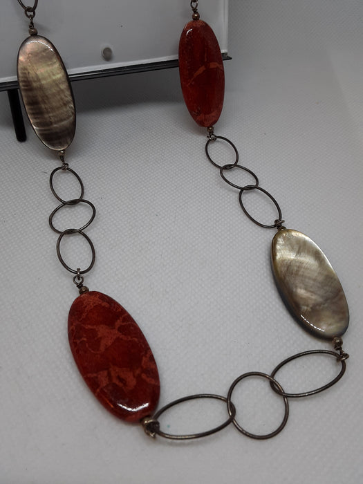 Silvertone circle necklace with coral and shell beads