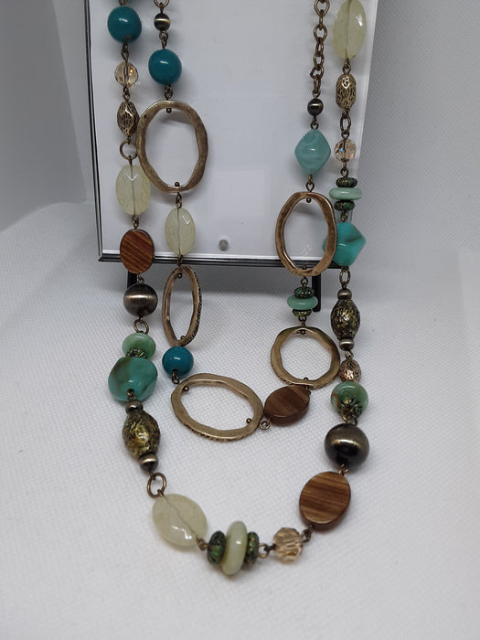 Brasstone necklace with brown and turquoise colored beads