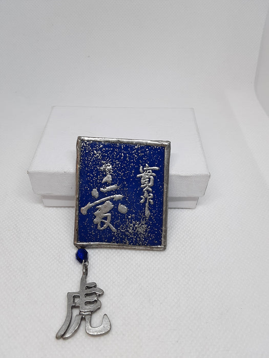 Royal blue ceramic brooch with silvertone accents