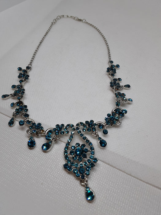 Blue rhinestone silvertone necklace and earring set