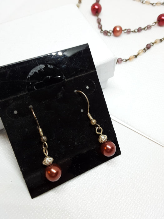 Brasstone red beaded necklace and earring set