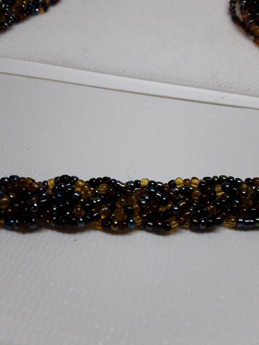 Multistrand brown, black, and blue beaded necklace