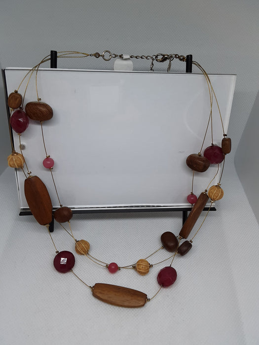 Cord necklace with brown and pink beads