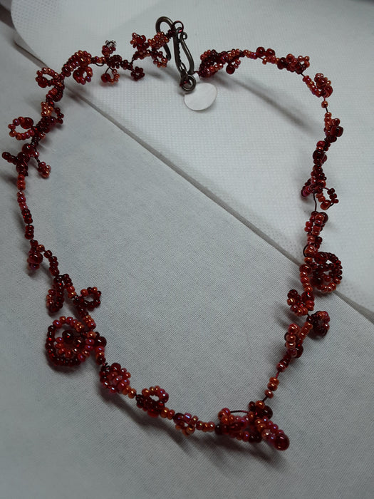 Red beaded choker necklace