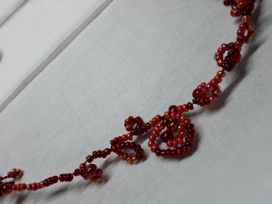 Red beaded choker necklace