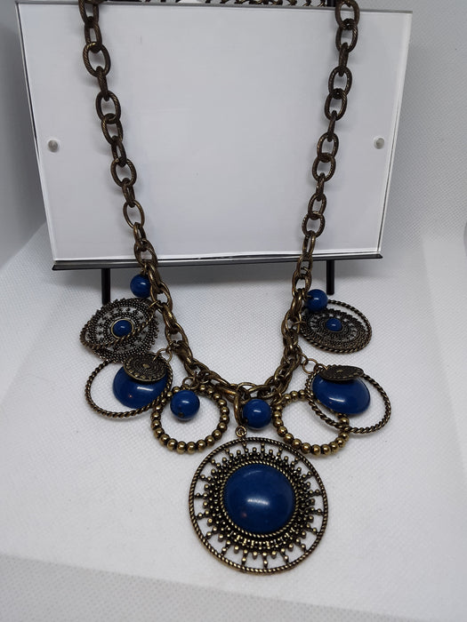 Brasstone necklace with brass and blue circle pendants