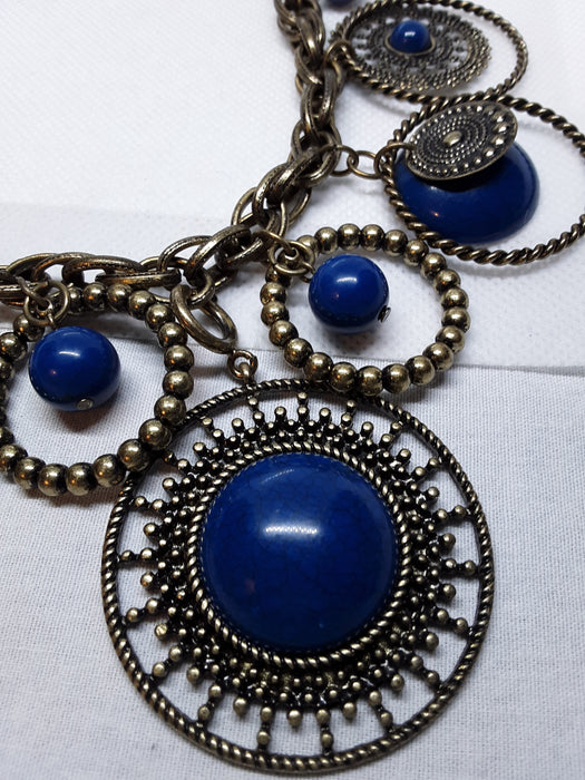 Brasstone necklace with brass and blue circle pendants
