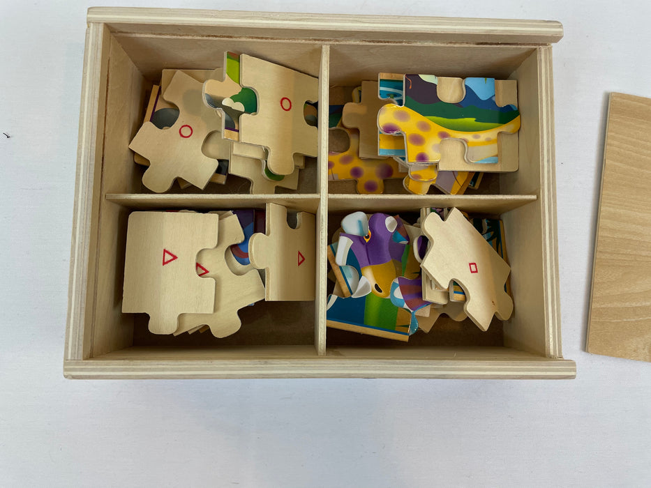 Melissa and Doug wooden jigsaw puzzles in a box